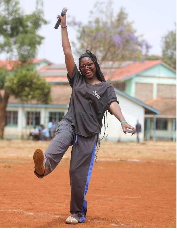 Sharon Ouma celebrating on the pitch